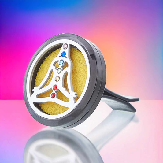 Infinity, energy

Enhance your trip with this unique aromatherapy diffuser. You can select your favourite essential oils or blends and experience the positive health benefits they provide while driving.  

The designer locket contains a felt pad which can hold a few drops of oil.   Clip to the ventilation panel in your car to allow the fragrance to flow. 